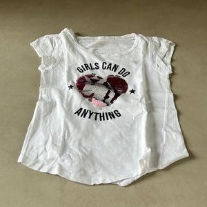 White shirt with sequence.